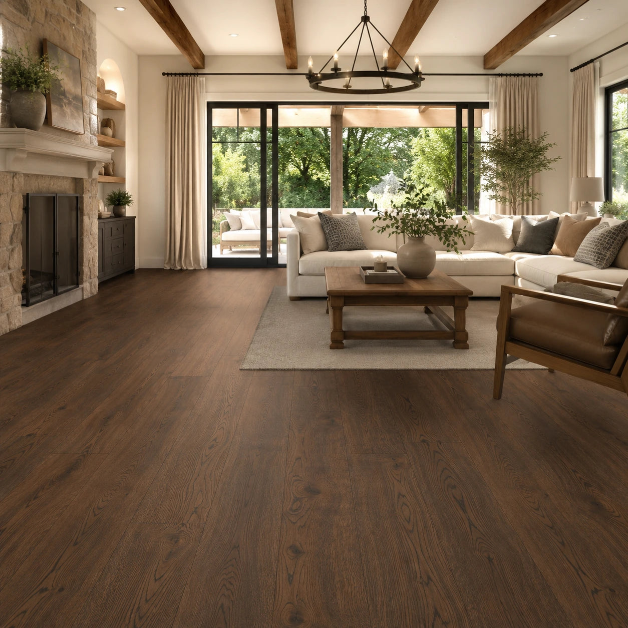 Living room with wooden flooring, furniture, and large windows.